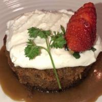 Warm Spice Carrot Cake · With vanilla bean soft cream cheese and Myer rum.