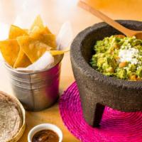 Guacamole · Vegetarian, vegan, gluten-free. Guacamole made to order, served with hand-pressed tortillas,...