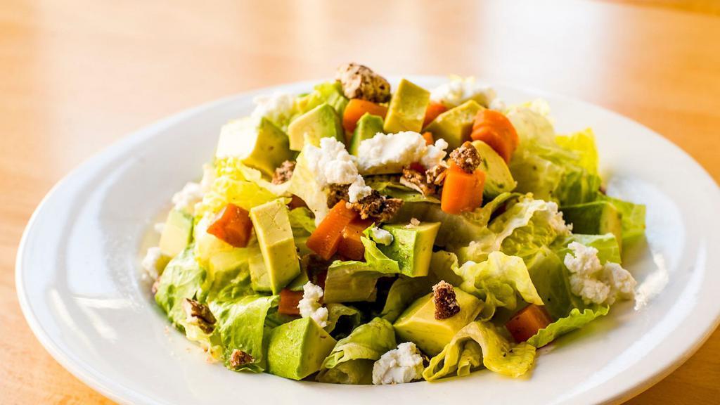 Ensalada De Aguacate Y Zanahorias · Avocados, roasted carrots, toasted pecans, soft goat cheese, sprouts and bibb lettuce drizzled with a lime mustard vinaigrette.