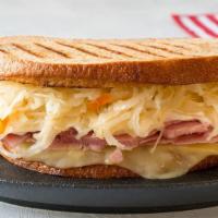 Pastrami Reuben Panini · Crispy, buttery, pressed sandwich loaded with pastrami, Swiss cheese, coleslaw and Thousand ...