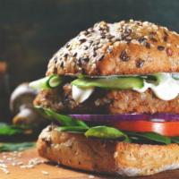 Veggie Burger · Delicious, grilled vegetarian patty with mozzarella cheese, fresh lettuce, tomatoes and onio...