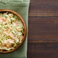 Coleslaw · Our homemade sweet and tangy coleslaw.
