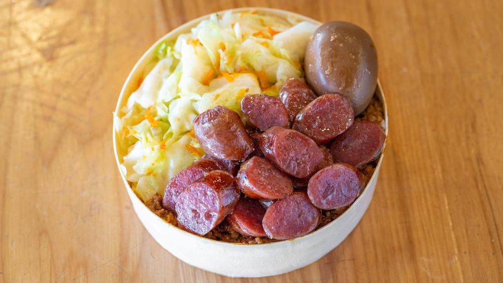 Taiwanese Sausage Bento Box 台灣香腸便當
 · Served with sauteed cabbage, braised egg and our signature braised minced pork(contain PEANUTS) over sushi-grade rice.