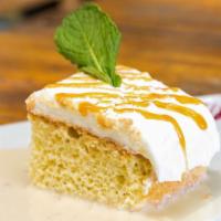 Tres Leches · Cake soaked in 3 milks topped with cream frosting.