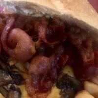 Brady Burger · Our most popular burger ,Bacon, cheese, and sautéed mushroom. Served with fries.