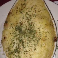 Shepherd'S Pie · Our famous traditionally made , ground beef perfectly seasoned with added vegetables topped ...