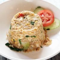 Pineapple Fried Rice Lunch Special · Pineapple, onion, scallions, tomatoes, cashew nuts and fried egg. Mixed with rice.