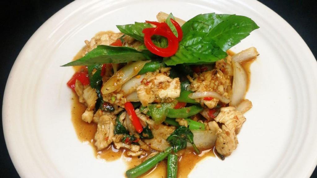 Sauteed Pad Krapraw Basil Lunch Special · Thai chili, string beans, onion, Thai bell pepper and basil leaves. Spicy.