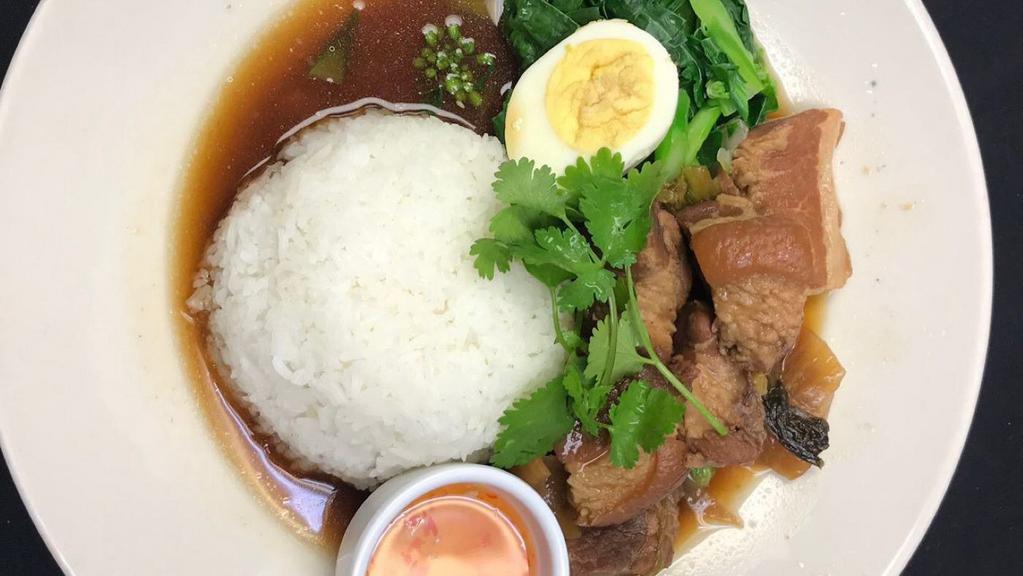 Kao Kha Moo Lunch Special · Braised pork belly in five spiced broth over rice, Chinese broccoli, pickle mustard greens, and hard-boiled egg.