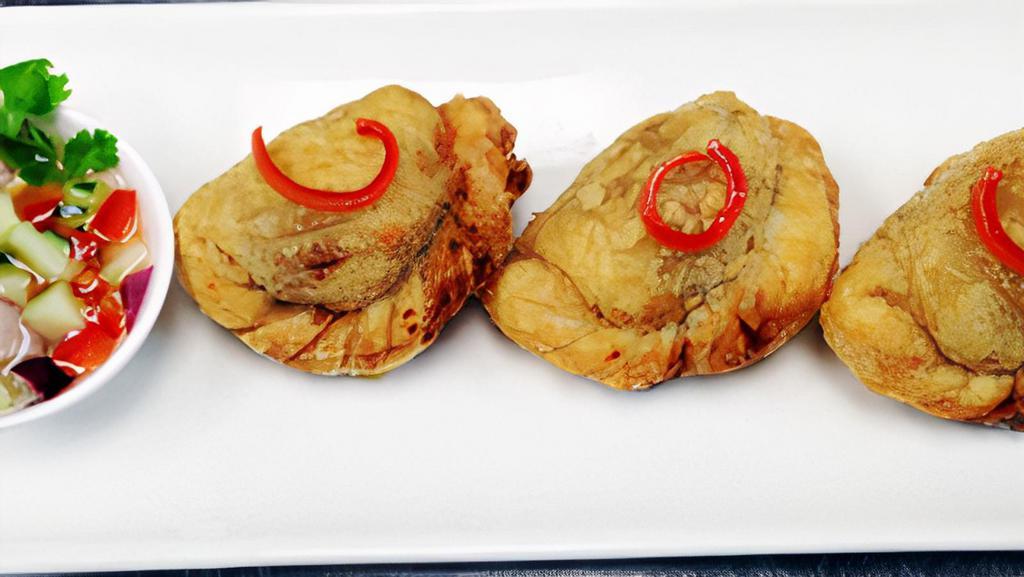 Curry Puffs · Minced chicken, potatoes, onion and curry powder served with sweet cucumber relish.