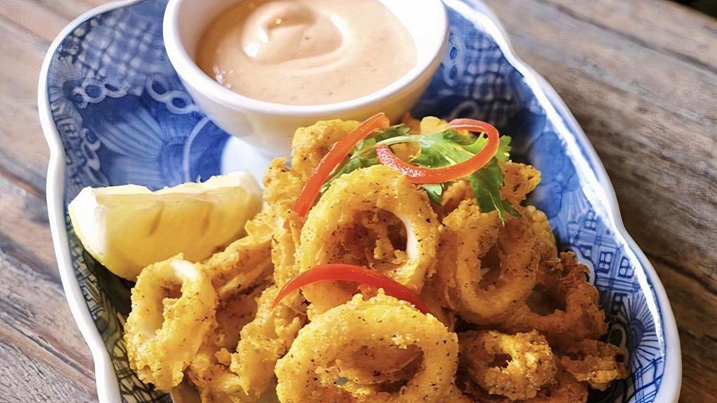 Pla Muk Tod · Crispy fried calamari served with spicy mayo.