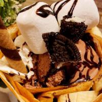 Tornado Crepe · Crushed Oreo, marshmallow, chocolate syrup, banana, and chocolate ice cream.