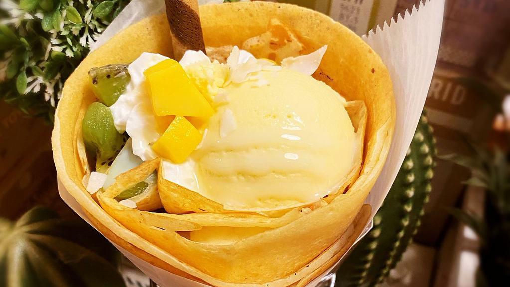 Tokyo Sundae · Mango, banana, kiwi, coconut chips, condensed milk, and mango ice cream.