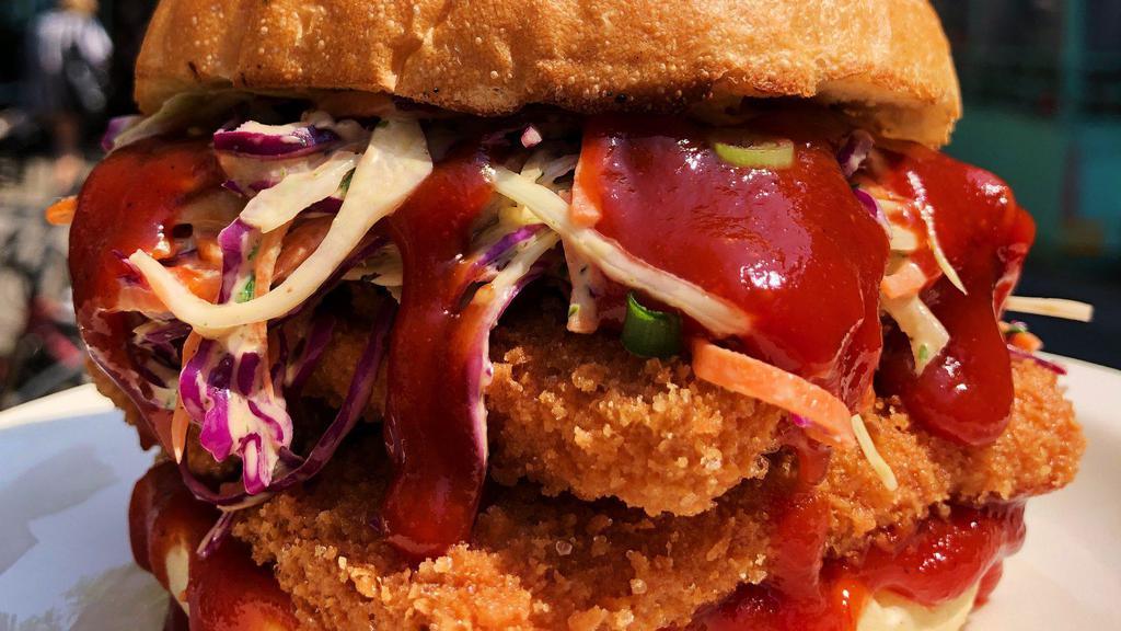 The Georgina Sandwich · Our house made fried tofu chik'n, tricolor slaw made with carrots, cabbage and scallions plus house made BBQ sauce served on a fresh roll. The chik'n is GF and the sandwich can be made GF on request.