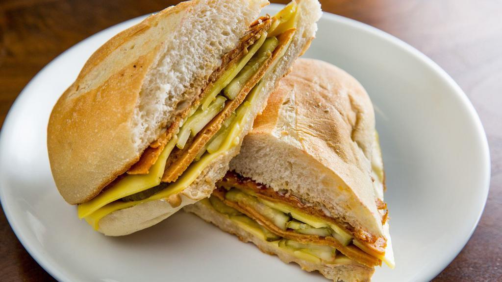  - The Francis Sandwich · Our take on the classic Cubano sandwich made with house made seitan ham, pickles, Violife cheese, dijon mustard and your choice of regular or spicy mayo.  Cannot be made gluten free.