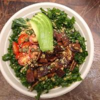 The Les Kale Caesar Salad · Chopped kale massaged with lemon juice and olive oil, topped with tempeh bacon, cherry tomat...