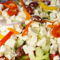 Greek · Lettuce, cherry tomatoes, cucumbers, red onions, bell peppers, olives and feta cheese.