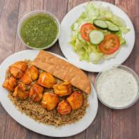 #10 Two Chicken Tikka · Served with rice, salad, and bread.