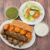 #1 Combination · One beef kofta, one lamb tikka, and one chicken tikka. Served with rice, salad, and bread.