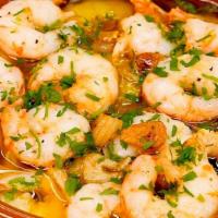 Garlic Shrimp · Wild gulf shrimp sautéed in olive oil, garlic, guindilla pepper.