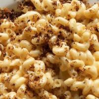 Pub Macaroni And Cheese · Classic pub-style macaroni and cheese loaded with aged Cheddar topped with seasoned bread cr...