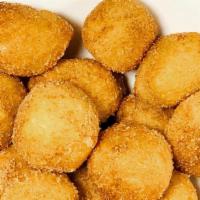 Fried Dough Bites · A heaping portion of our house-made fried dough. Served with a trio of sauces for dipping. E...