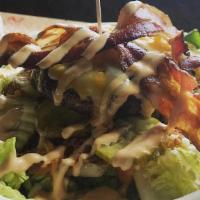 Hool'S Burger Salad · Hooligan’s hand pressed burger, lettuce, tomato, Cheddar jack cheese, pickles, bacon, and sp...
