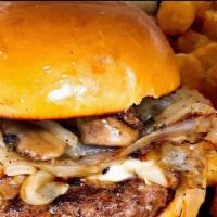 Mushroom Swiss Burger · A small twist on a classic-Swiss cheese, sautéed mushrooms, and onions topped with garlic ai...