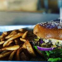 Mac Daddy Burger · Hand-cut burger, lettuce, American cheese, pickles, onions, and special sauce on a sesame se...