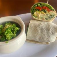 Skinny Wrap · Hummus, spinach, roasted red peppers, cucumbers, and banana peppers, in a wrap, served with ...
