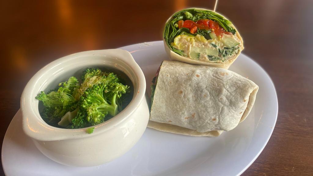Skinny Wrap · Hummus, spinach, roasted red peppers, cucumbers, and banana peppers, in a wrap, served with fresh steamed broccoli.