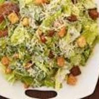 Caesar Salad (Large) · Romaine lettuce, croutons and Parmesan cheese tossed with Caesar dressing.