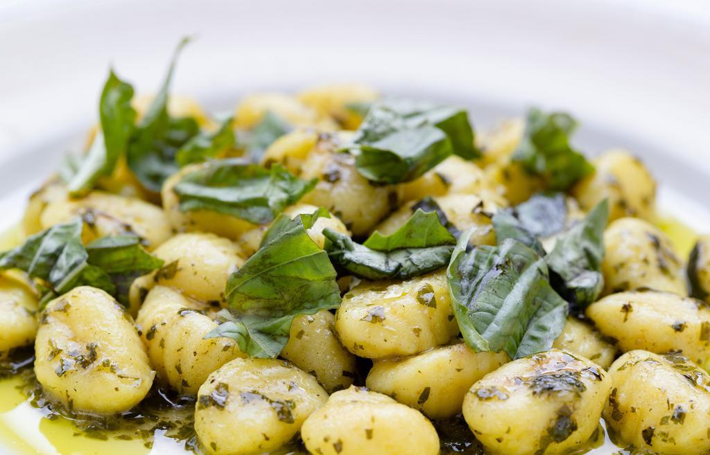 Gnocchi · Homemade gnocchi, fresh sage, touch of butter, walnuts and parmigiano-reggiano.