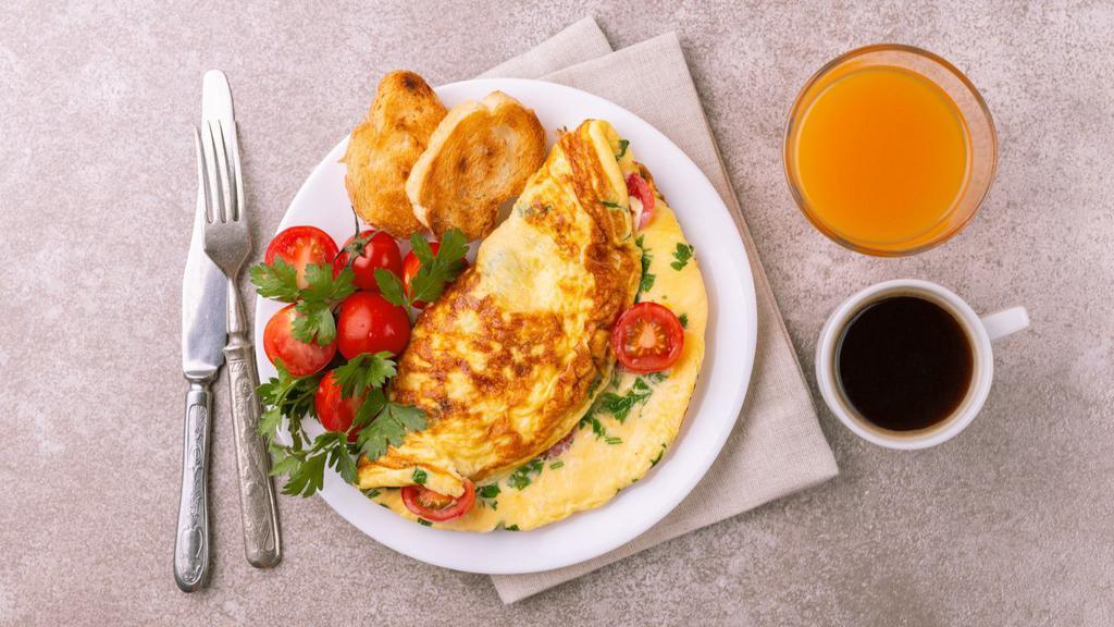 Wastern Omelette · Three whole eggs mixed with customer choice of cheese, peppers, onions, and ham.