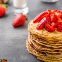 Strawberry Pancakes · Fluffy buttermilk pancakes served with strawberries.