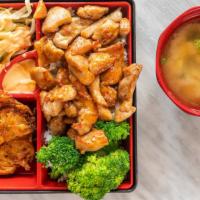Chicken Teriyaki Box · Chicken teriyaki served with white rice, fried kakiage, Japanese coleslaw and miso soup.