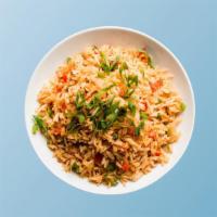 Vegetable Fried Rice Yang Chow · Long grain aromatic rice wok tossed with seasonal mixed fresh vegetables and Indo-Chinese sh...