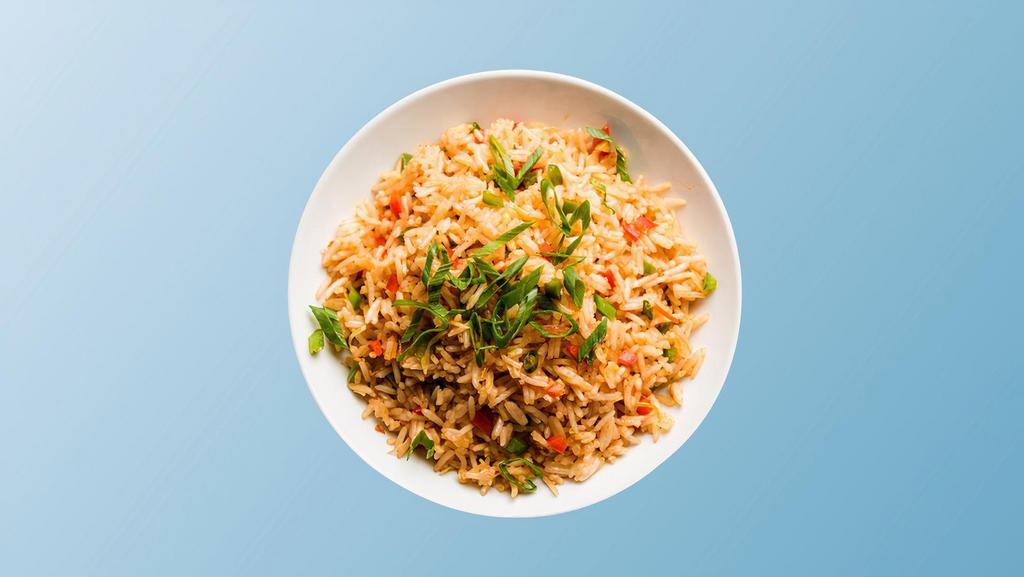 Vegetable Fried Rice Yang Chow · Long grain aromatic rice wok tossed with seasonal mixed fresh vegetables and Indo-Chinese shezwan sauce.