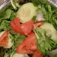 House Salad · A mixture of fresh seasonal greens.