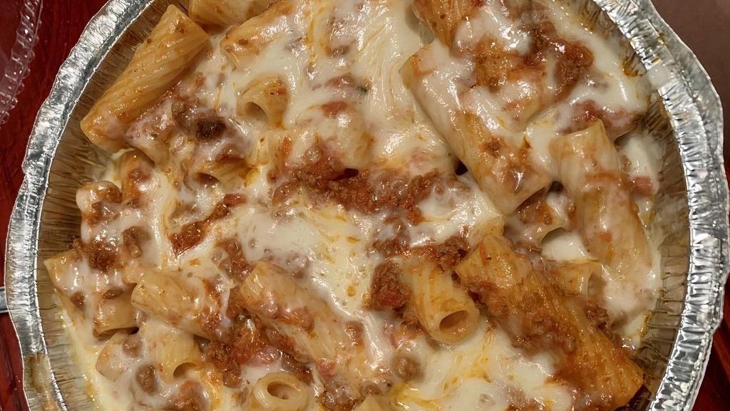 Baked Ziti · Ziti with mozzarella and tomato sauce baked to perfection in our oven. Add meat sauce for an additional charge.