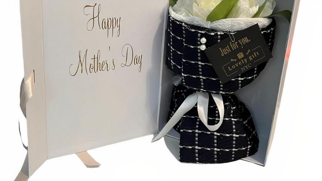 Mother'S Day White Rose Bouquet Box · Arraignment includes:
- Half dozen white roses 
- Baby’s breath. Gypsophila
- High quality BBJ wrap korean paper
- Customized Black plaid wrap fabric  with pearls.
-  Hand craft medium white pearl  box
- Greeting note
-  Customized lettering upon request