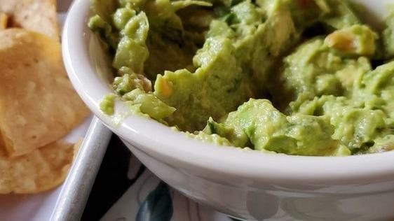 Guacamole & Chips · Gluten-free. Avocado, lime, tomatoes, and onions.