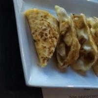 Kids Quesadillas · Cheese quesadillas made with flour tortillas. pork, chicken for an additional charge.