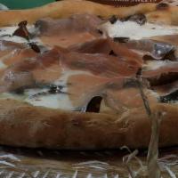 Gf Pizza Del Re · truffle cream, fresh mozzarella, assorted mushrooms, prosciutto di Parma, basil, extra virgi...