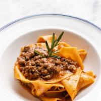 Pappardelle Al Ragu · Slow cooked beef ragu bolognese style.