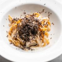 Tagliatelle Al Tartufo · Egg pasta with truffle sauce