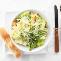 Caesar Salad · Crispy romaine lettuce, Parmigiano cheese, hand-made croutons, and dressed with our signatur...
