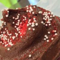Sassy Red Velvet Cupcake · Red Velvet cupcake with chocolate almond buttercream. Sprinkles may vary.