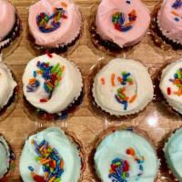 Mini Black & White Cupcakes · Dark chocolate cake with various colored buttercream and sprinkles.
Pack of 12.  Sprinkles m...