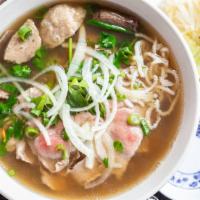 Pho Sao Mai · House special noodle. Brisket, beef eye round, and beef ball in traditional beef noodle brot...